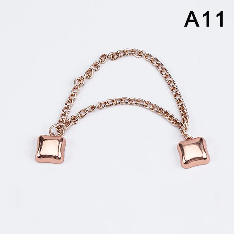 Clip per gambe dei pantaloni regolabili magnetiche per pantaloni, spilla retrattile per pantaloni con gamba fissa, bottone allentato per jeans, cardigan