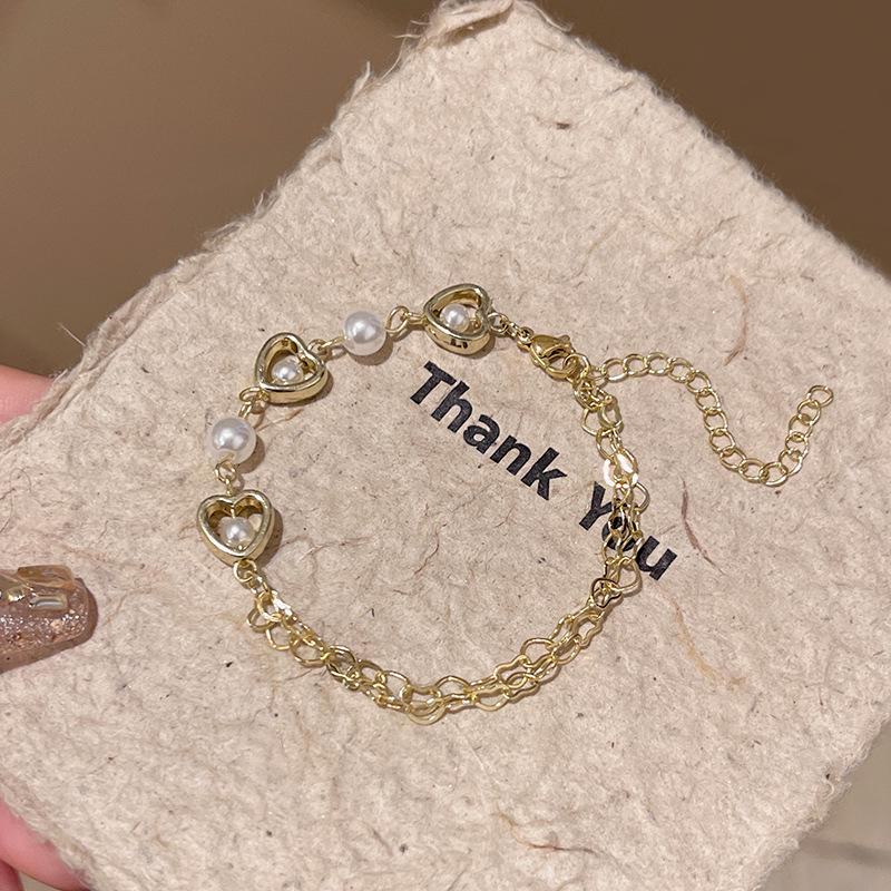 Korean Hollow Heart Pearl Bracelet - Elegant, Cold Style Jewelry for Women