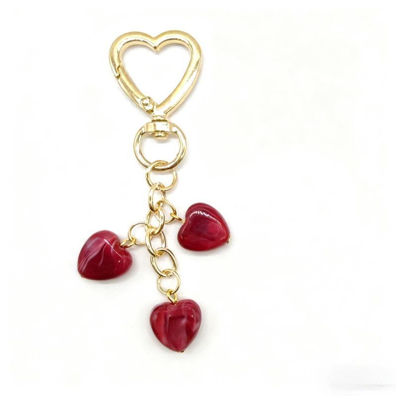 Koreańska Moda Breloczek z Serduszkiem i Smyczka do Telefonu z Zawieszką z Koralików