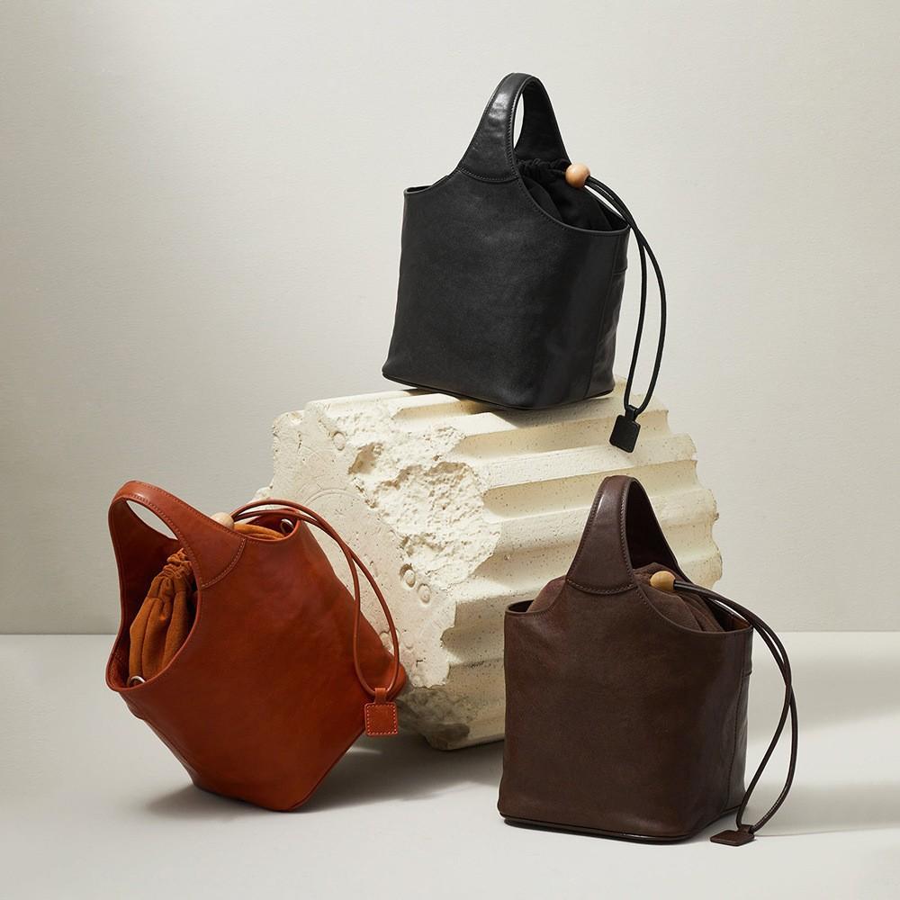 Leather women's bags come to pictures and samples, high-end fashion messenger bags, women's OEM drawstring bucket bags