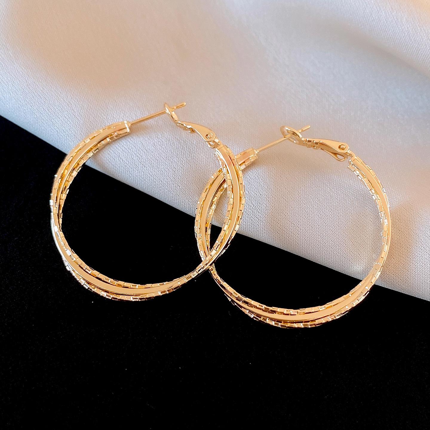 Европейские и американские простые многослойные перекрестные круглые серьги серьги модные темпераментные серьги женские