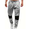 Spring And  New Men's Fashion Leisure Color Blocked Running Sports Pants Personalized Sports Pants