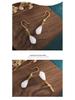 Retro Chinese Hanfu Earrings: Ancient Gold Clouds & Synthetic White Jade Magnolia