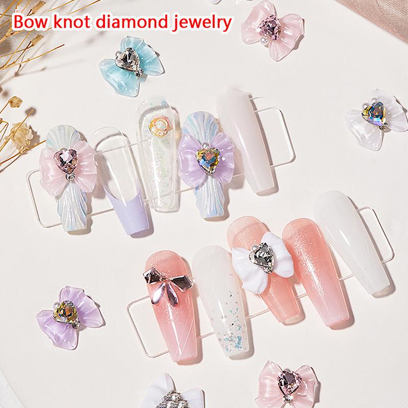 5 Stück 3D Harzschleife mit Glitzerherz Perle Nail Art Schmuck Dekorationen Frauen Nagelstudio Luxus Maniküre Charms