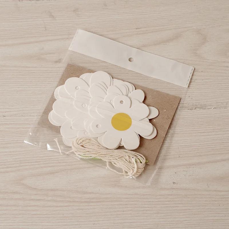 Weiße Gänseblümchen Girlande Anhänger: Dekobanner für Kinderparty