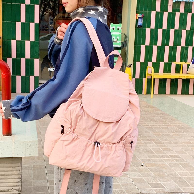 Korean version of fashionable nylon solid color schoolbag spring new versatile lightweight travel bag large capacity student bag women