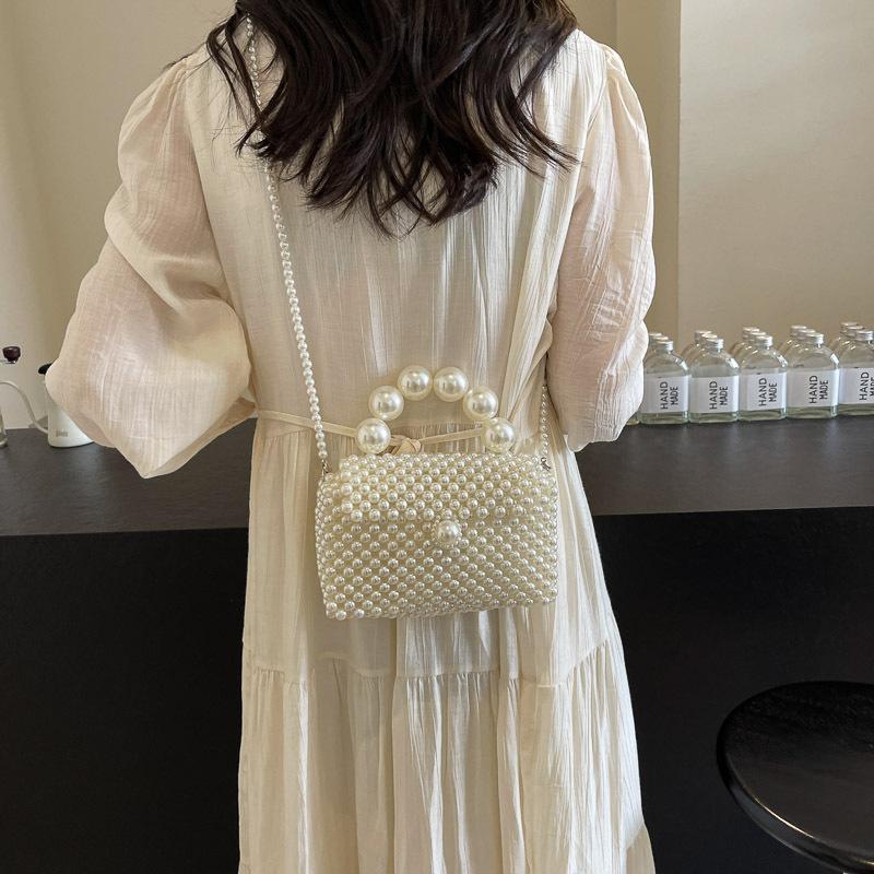 Borsa a tracolla piccola in perle tessuta a mano alla moda versatile mini borsa quadrata squisita portatile con catena di perle borsa da donna
