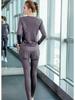 Damski dopasowany zestaw do jogi i biegania: Top z długim rękawem i spodnie, szybkoschnące, podkreślające sylwetkę, na jesień