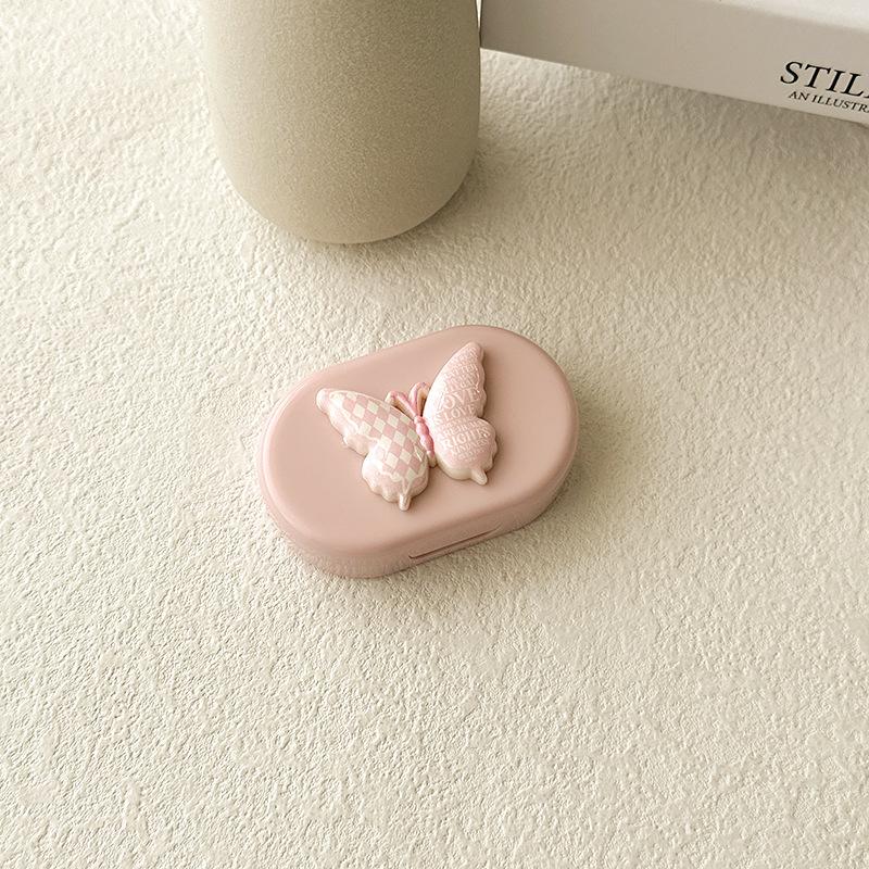 Bonbonfarbene Kontaktlinsenbox Niedliche Schleife Tragbarer Kontaktlinsenbehälter mit Pinzette Saugstab Set für Reise-Kit-Halter