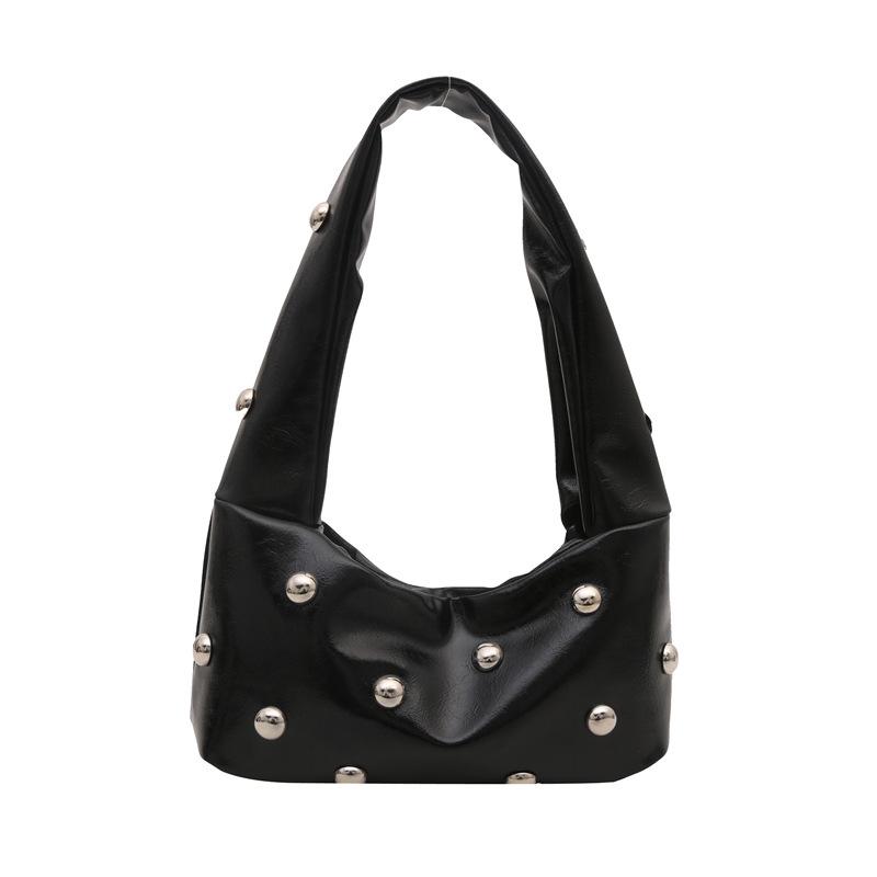 Internet celebrity armpit bag ladies 2025 new Korean version of fashion niche shoulder bag personalized rivets hand carry dumpling bag pu
