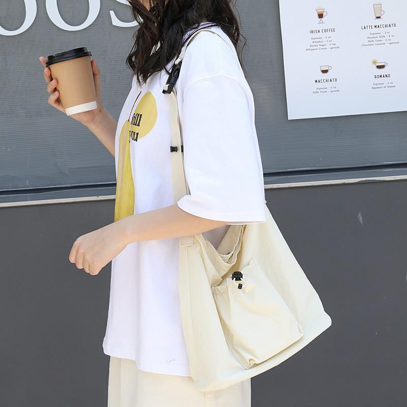 

IELGY Корейская версия повседневной литературной нейлоновой простой холщовой сумки через плечо на шнурке бежевый