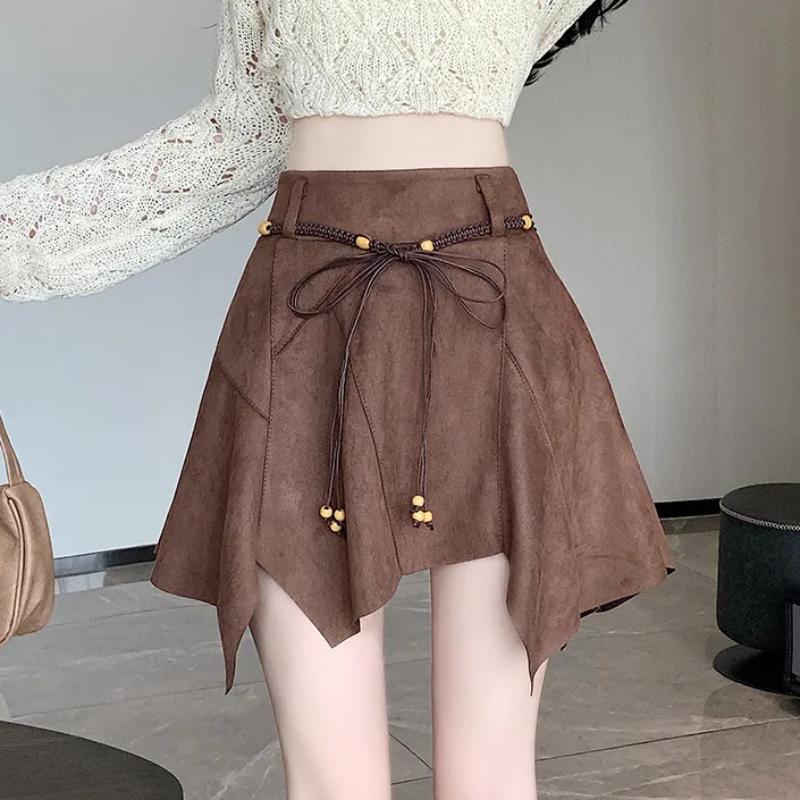 Женская коричневая замшевая мини-юбка с неровным подолом на шнуровке S коричневый