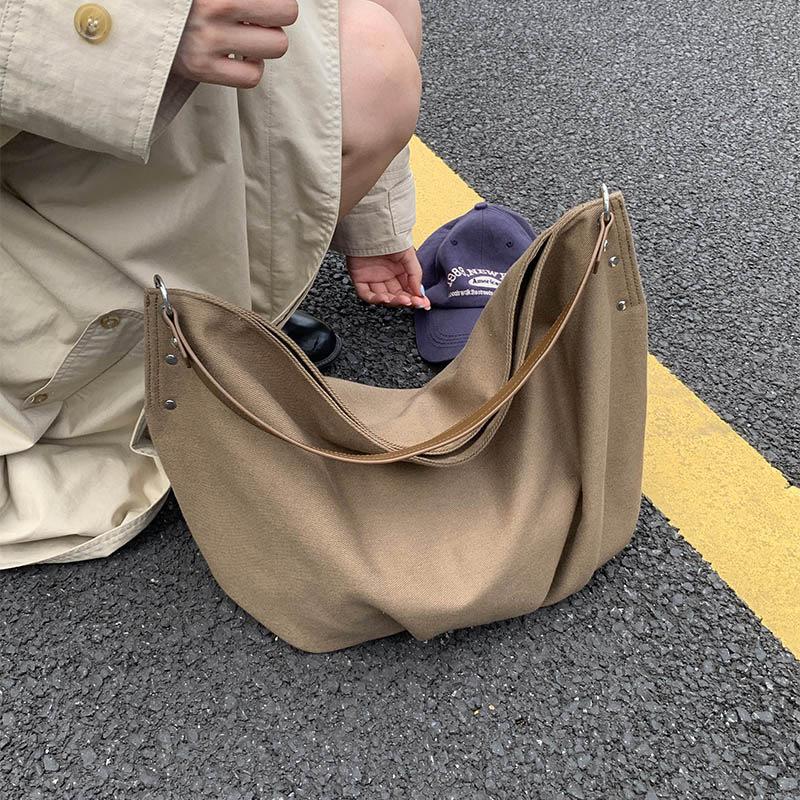 Casual commuting large-capacity canvas bag women's 2025 new lightweight and versatile messenger bag soft shoulder tote bag