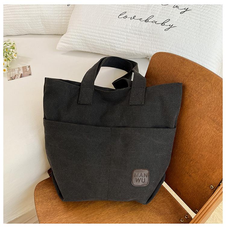 

Women s bag spring new fashion versatile niche design tote bag trendy portable shoulder bag чёрный