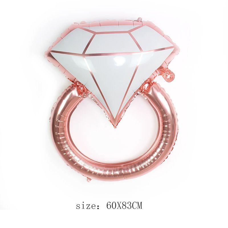 Téma Rozlučka se svobodou: Sada balónků pro rozlučku se svobodou v barvě Rose Gold; Sada balónků s vlajkou pro budoucí nevěstu; Sada prstenů s diamantem v láhvi vína