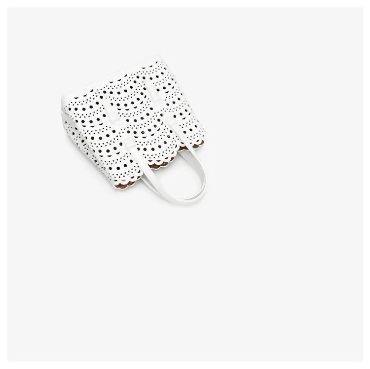 Dámská crossbody kabelka z ručně broušené hovězí kůže, laserově řezaná, z pravé kůže