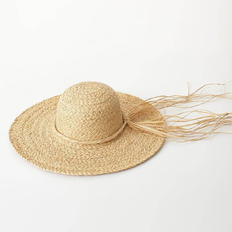 Spring and summer new versatile casual hand-woven straw hat fashionable raffia rough edge beach vacation sun protection simple sun hat