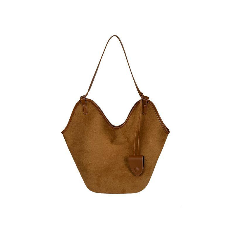 Koreanische Version Retro Wildleder Eimerbeutel mit großem Fassungsvermögen neue Entspannung Schultertasche Nische vielseitige Pendler Tragetasche