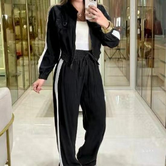 

Женский спортивный комплект на осень/зиму 2025 года: топ с длинными рукавами на молнии и брюки на резинке. Extra Large чёрный