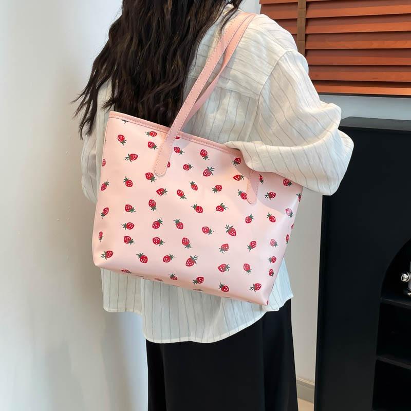 The new beautiful and fresh summer popular versatile large-capacity students commute to class versatile portable shoulder armpit bag