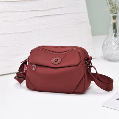 Compact Crossbody Bag with Adjustable Strap and Multiple Pockets for Everyday Use and Travel