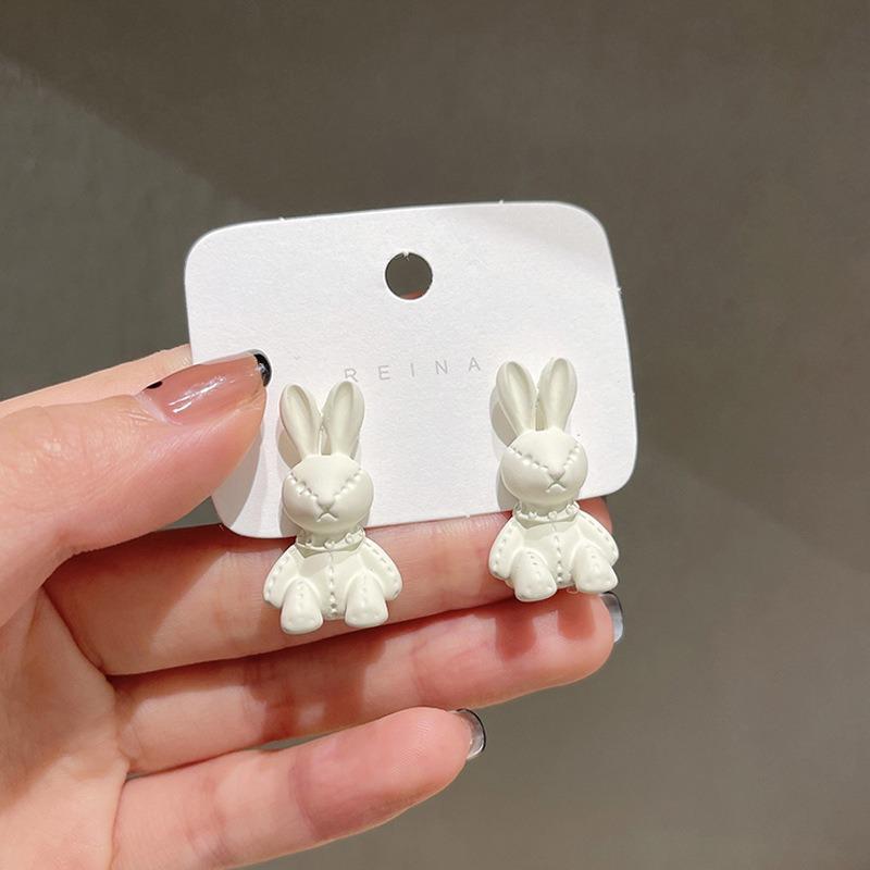 Cute Japanese and Korean white rabbit earrings female niche unique sweet stud earrings earrings New Year's trendy and small face