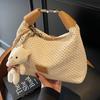 Woven straw bag women's 2025 new summer niche design messenger bag versatile high-end portable dumpling bag