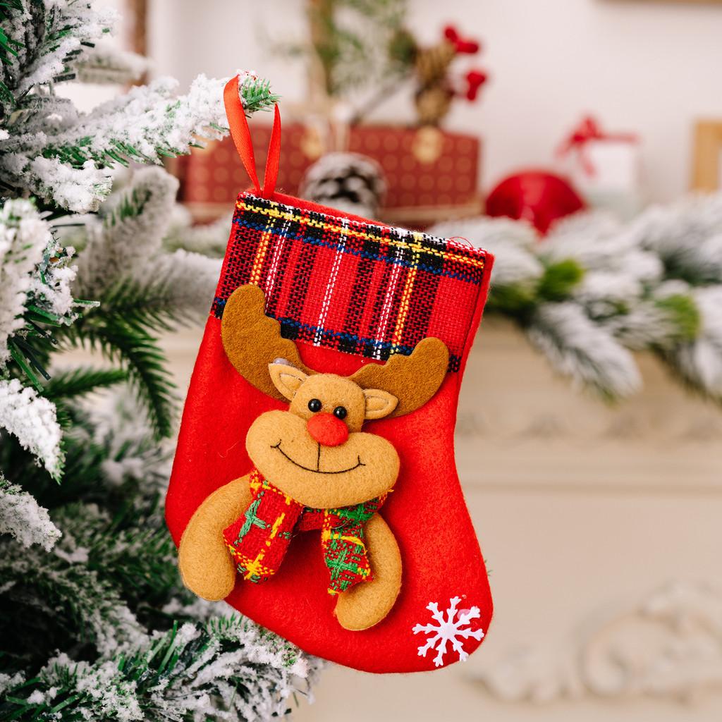 Decorative Red Christmas Stockings With Fun Cartoon Designs Of Santa Snowman Reindeer Bear For Vibrant Celebrations Festive