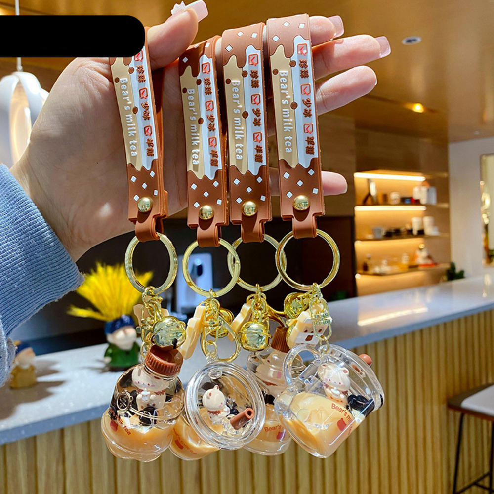 Cartoon oil floating liquid quicksand bottle pearl milk tea bear key chain cute trendy car key chain pendant Key Ring