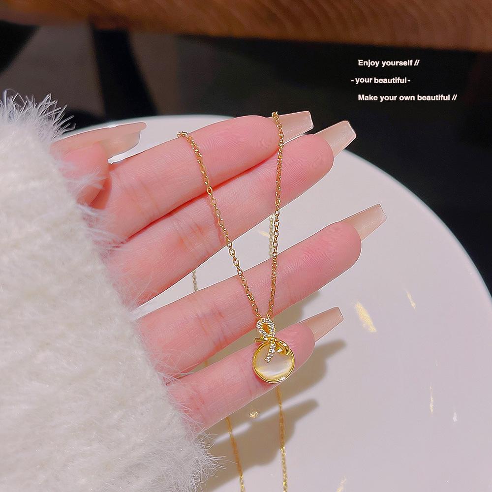 Online celebrity bow necklace titanium steel simple personality design sense Opal clavicle chain hot accessories.