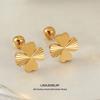 A Pair of Lucky Clover Earrings, Lightweight and Durable Design, Versatile Earrings for Daily Wear, Symbolizing Exquisite Earrings and Luck.