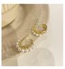 Korean Style Pearl Hoop Earrings: Silver Needle Studs for Women - Luxurious Autumn/Winter Bridal Jewelry with High-End Appeal.