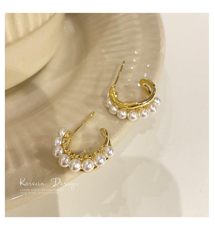 Korean Style Pearl Hoop Earrings: Silver Needle Studs for Women - Luxurious Autumn/Winter Bridal Jewelry with High-End Appeal.