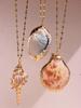 Retro Gold-Tone Shell Pendant Necklace Unique Layered DIY Fashion Jewelry for Women Perfect for Beach Vacations Gift Idea