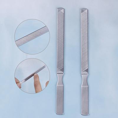 Lima de metal de acero inoxidable para manicura y pedicura de doble cara.