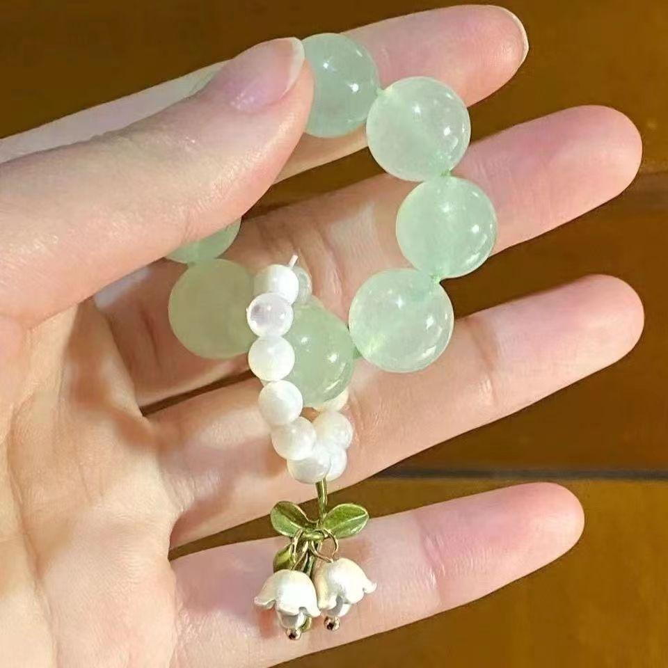 

Xiaohongshu Peach Finger Twist Beads Around Finger Ring Super Fairy Peach Blossom Decompression Niche Design Student Pan Beads