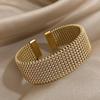 European & American Fashion Titanium Steel Woven Bracelet Plated with 18K Gold - Colorfast Jewelry.