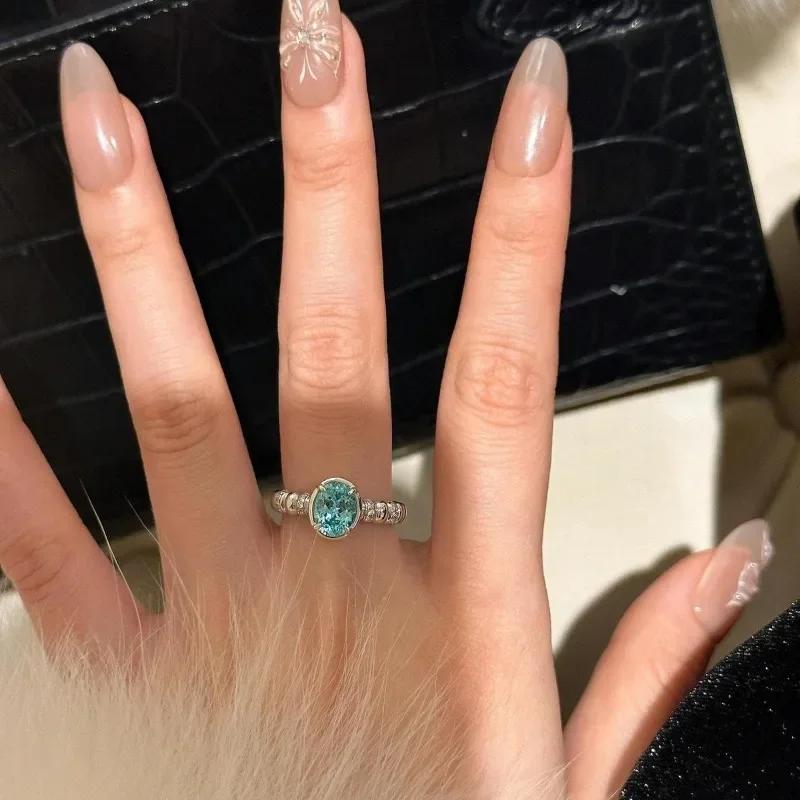 Bagues ovales en pierre précieuse bleu mer incrustée brillante pour femmes luxe léger Paraiba Simplicité bague de mode fête bijoux fins