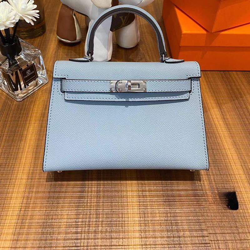 Grenzüberschreitende Hersteller Großhandel Damenhandtaschen 2023 neue Handtaschen aus Leder mit Palmenmuster tragbare Schulter-Umhängetaschen Damenhandtaschen große Kapazität