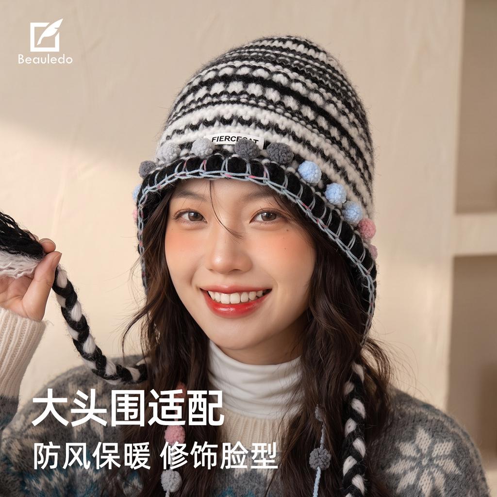 Sweet and cool color matching jacquard ear cap, colored ball twist braid wool hat modified face shape autumn and winter knitted hat women