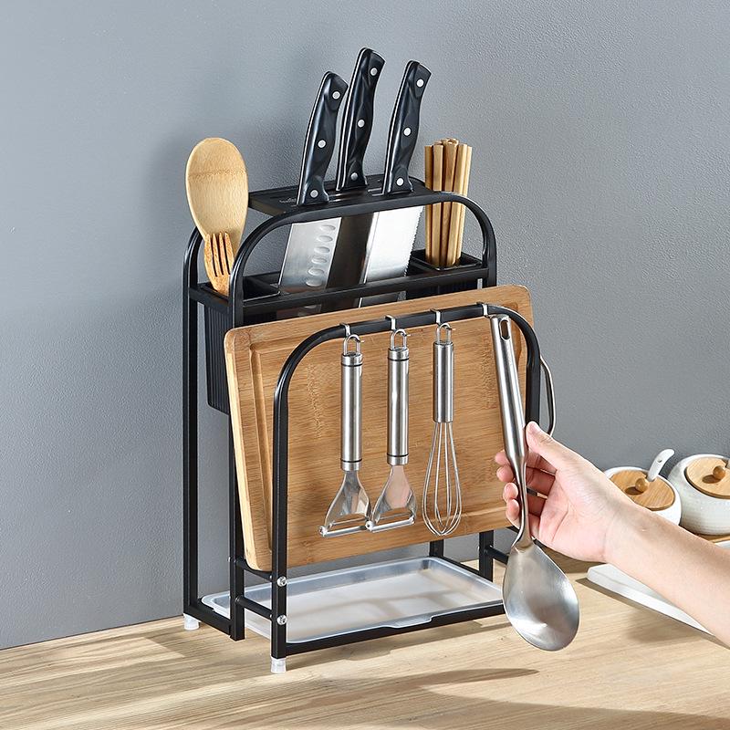 Stainless Steel Kitchen Utensil Holder with Integrated Chopping Board and Multifunctional Storage for Knives and Chopsticks.