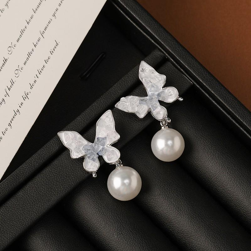 Silver Needle Crystal Butterfly Tassel Earrings with Pearls - Elegant, Nature-Inspired Jewelry for Women.