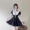 Sexy low-cut lapel dress, waist and thin, big swing a-word skirt, work clothes.