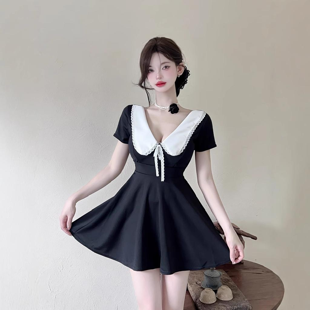 Sexy low-cut lapel dress, waist and thin, big swing a-word skirt, work clothes.