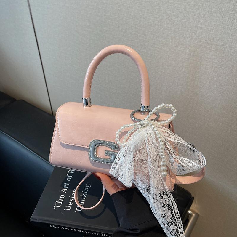 

Simple and versatile portable small square bag New summer niche fashion shoulder bag Crossbody women s bag розовый