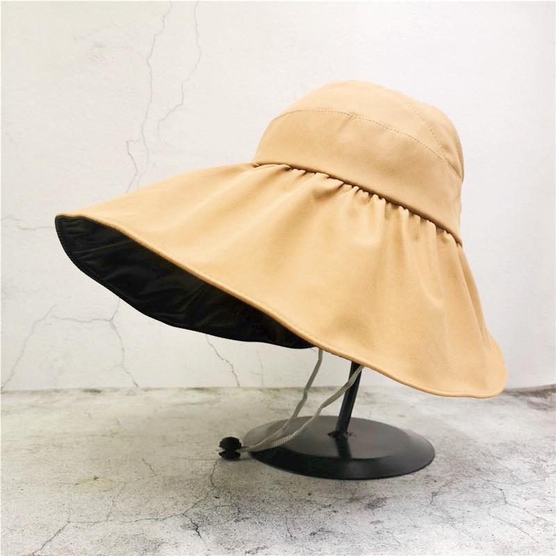 Women's Black Vinyl Bucket Hat with UV Face Shield, Adjustable & Foldable Summer Sun Protection Hat.