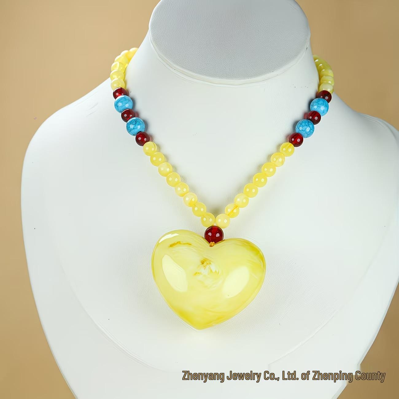 

Natural Russian Amber Peach Heart Pendant: White Beeswax Flower with Yellow Demon Flower Design жёлтый