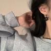 Korean Retro Cute Black Resin Flower Sweet Cool Flower Contrasting Color Circle Earrings Metal Cold Wind Design Sense