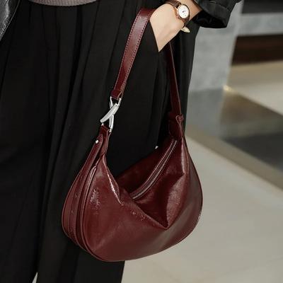 Bolso de lujo de piel auténtica para mujer, nuevo bolso de hombro de alta calidad, bolso de mano urbano, versátil y moderno.