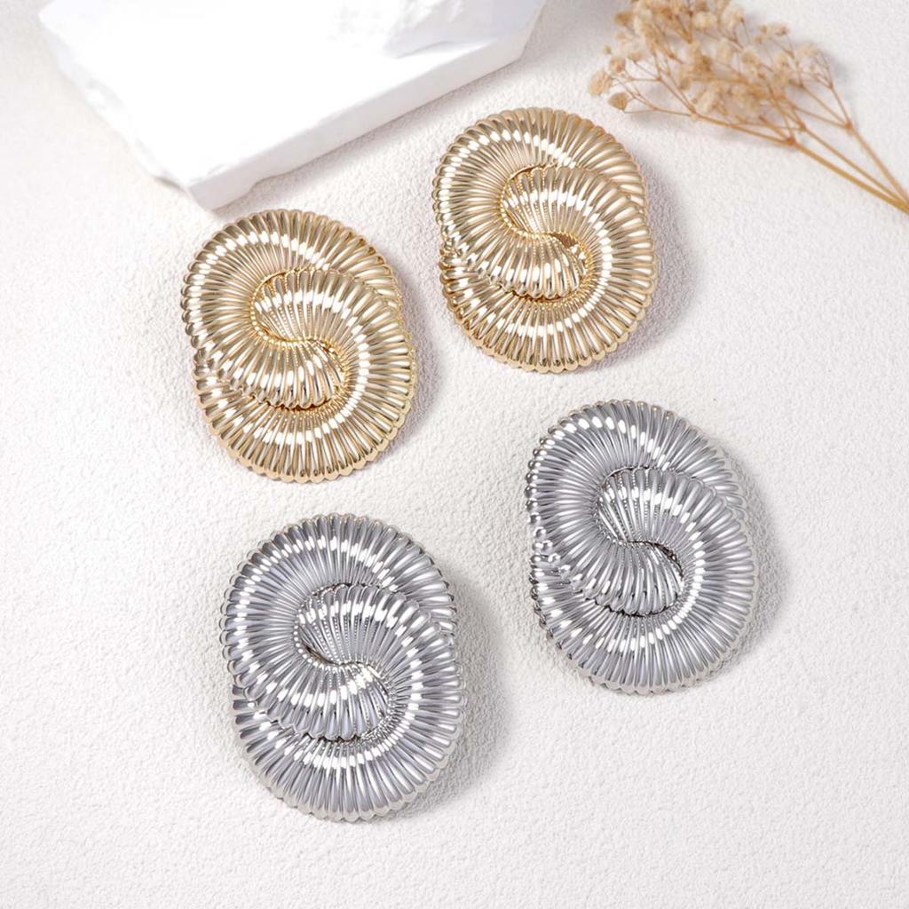 Exaggerated and powerful metal twisted spring wavy stud earrings for ladies, versatile and trendy street style for women